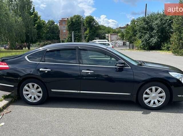 Чорний Ніссан Теана, об'ємом двигуна 2.5 л та пробігом 223 тис. км за 7300 $, фото 4 на Automoto.ua