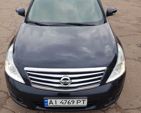 Черный Ниссан Теана, объемом двигателя 2.5 л и пробегом 302 тыс. км за 7250 $, фото 3 на Automoto.ua