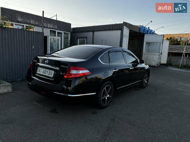 Черный Ниссан Теана, объемом двигателя 2.5 л и пробегом 286 тыс. км за 7400 $, фото 1 на Automoto.ua