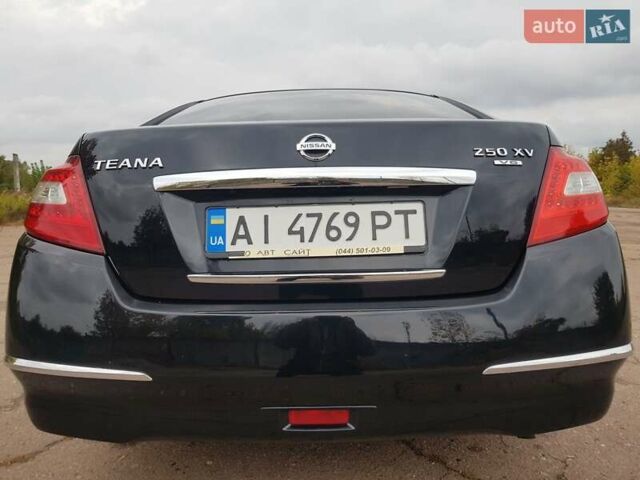 Черный Ниссан Теана, объемом двигателя 2.5 л и пробегом 302 тыс. км за 7250 $, фото 11 на Automoto.ua