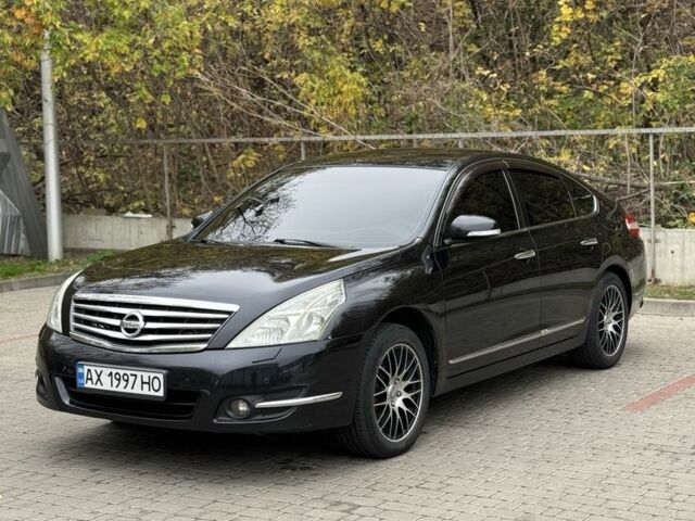 Черный Ниссан Теана, объемом двигателя 2.5 л и пробегом 246 тыс. км за 6100 $, фото 2 на Automoto.ua