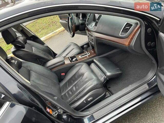 Черный Ниссан Теана, объемом двигателя 2.5 л и пробегом 241 тыс. км за 7000 $, фото 12 на Automoto.ua