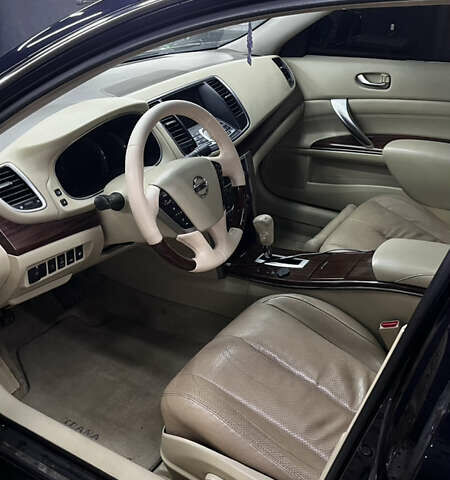 Черный Ниссан Теана, объемом двигателя 3.5 л и пробегом 215 тыс. км за 7700 $, фото 28 на Automoto.ua
