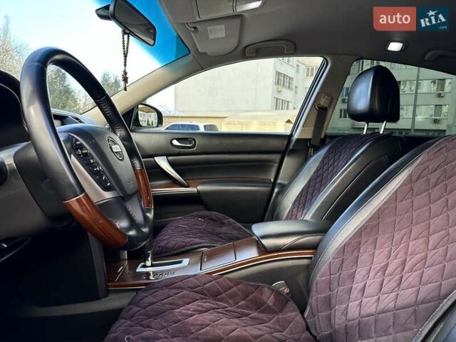 Черный Ниссан Теана, объемом двигателя 2.5 л и пробегом 197 тыс. км за 7500 $, фото 18 на Automoto.ua
