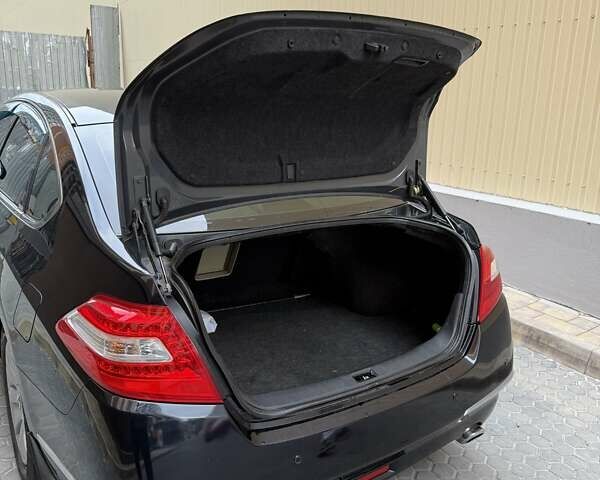 Черный Ниссан Теана, объемом двигателя 2.5 л и пробегом 210 тыс. км за 7400 $, фото 10 на Automoto.ua