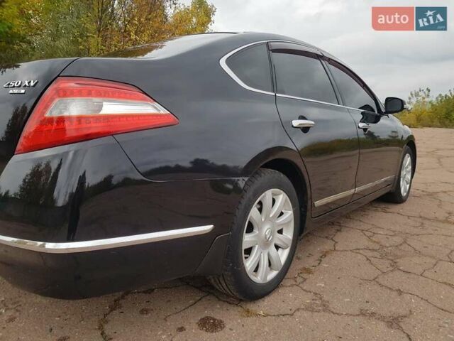 Черный Ниссан Теана, объемом двигателя 2.5 л и пробегом 302 тыс. км за 7250 $, фото 8 на Automoto.ua