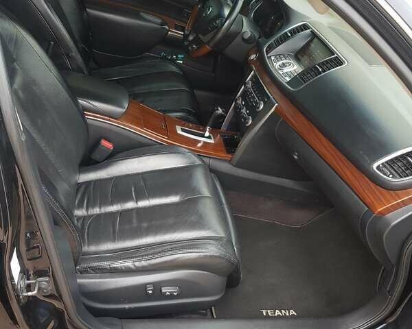 Черный Ниссан Теана, объемом двигателя 2.5 л и пробегом 302 тыс. км за 7250 $, фото 24 на Automoto.ua