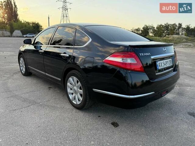 Черный Ниссан Теана, объемом двигателя 3.5 л и пробегом 255 тыс. км за 8200 $, фото 8 на Automoto.ua