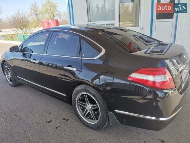 Черный Ниссан Теана, объемом двигателя 2.5 л и пробегом 250 тыс. км за 7200 $, фото 6 на Automoto.ua