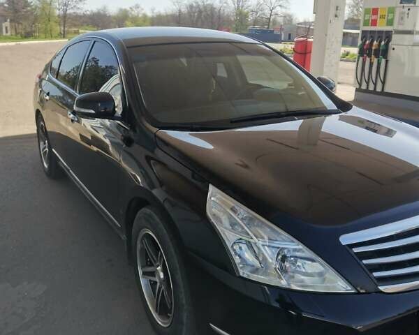Черный Ниссан Теана, объемом двигателя 2.5 л и пробегом 250 тыс. км за 7200 $, фото 2 на Automoto.ua