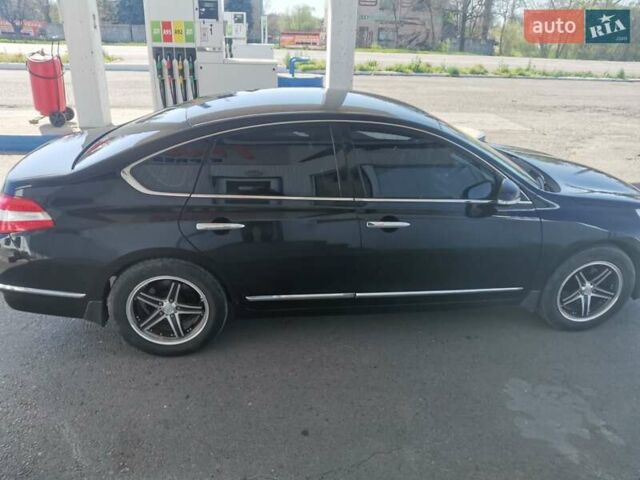 Черный Ниссан Теана, объемом двигателя 2.5 л и пробегом 250 тыс. км за 7200 $, фото 3 на Automoto.ua