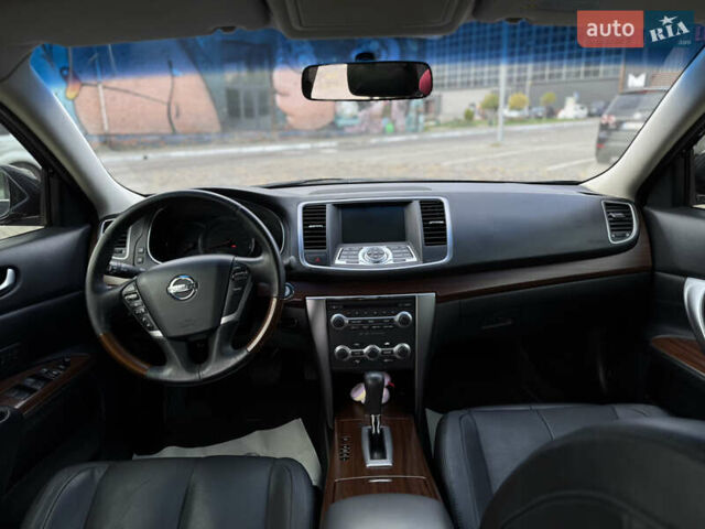 Ниссан Теана 2010 в Луцке на Automoto.ua Черный Ниссан Теана, объемом двигателя 2.5 л и пробегом 127 тыс. км за 11900 $, фото 47 на Automoto.ua
