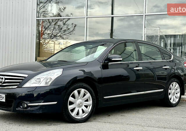 Чорний Ніссан Теана, об'ємом двигуна 2.5 л та пробігом 187 тис. км за 9500 $, фото 1 на Automoto.ua