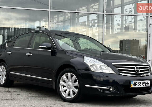 Чорний Ніссан Теана, об'ємом двигуна 2.5 л та пробігом 187 тис. км за 9500 $, фото 2 на Automoto.ua