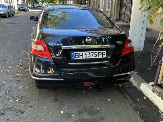 Черный Ниссан Теана, объемом двигателя 3.5 л и пробегом 240 тыс. км за 6900 $, фото 1 на Automoto.ua
