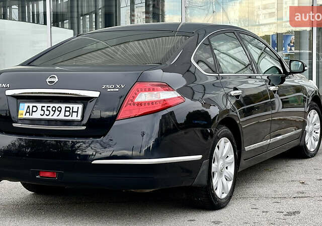 Чорний Ніссан Теана, об'ємом двигуна 2.5 л та пробігом 187 тис. км за 9500 $, фото 4 на Automoto.ua