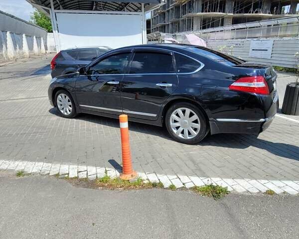 Черный Ниссан Теана, объемом двигателя 3.5 л и пробегом 175 тыс. км за 10300 $, фото 14 на Automoto.ua