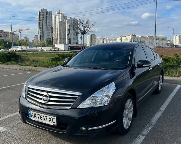 Черный Ниссан Теана, объемом двигателя 2.5 л и пробегом 193 тыс. км за 8500 $, фото 1 на Automoto.ua