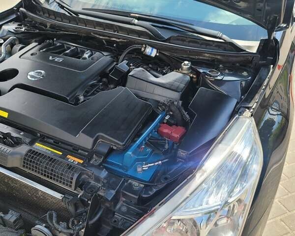 Черный Ниссан Теана, объемом двигателя 3.5 л и пробегом 175 тыс. км за 10300 $, фото 48 на Automoto.ua