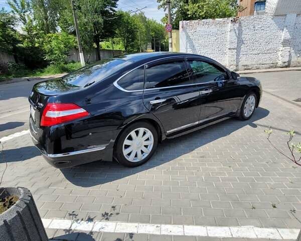 Черный Ниссан Теана, объемом двигателя 3.5 л и пробегом 175 тыс. км за 10300 $, фото 11 на Automoto.ua