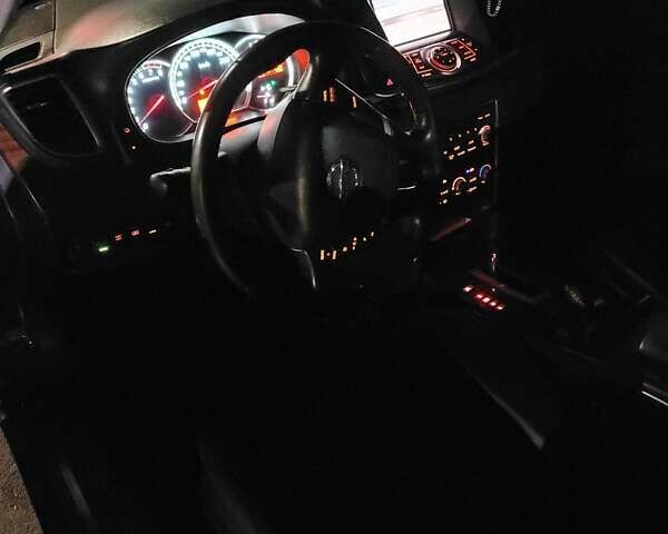 Черный Ниссан Теана, объемом двигателя 3.5 л и пробегом 175 тыс. км за 10300 $, фото 15 на Automoto.ua