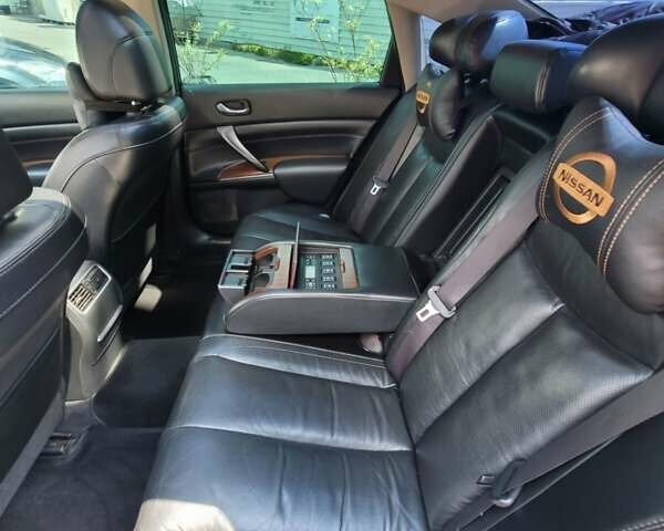 Черный Ниссан Теана, объемом двигателя 3.5 л и пробегом 175 тыс. км за 10300 $, фото 33 на Automoto.ua