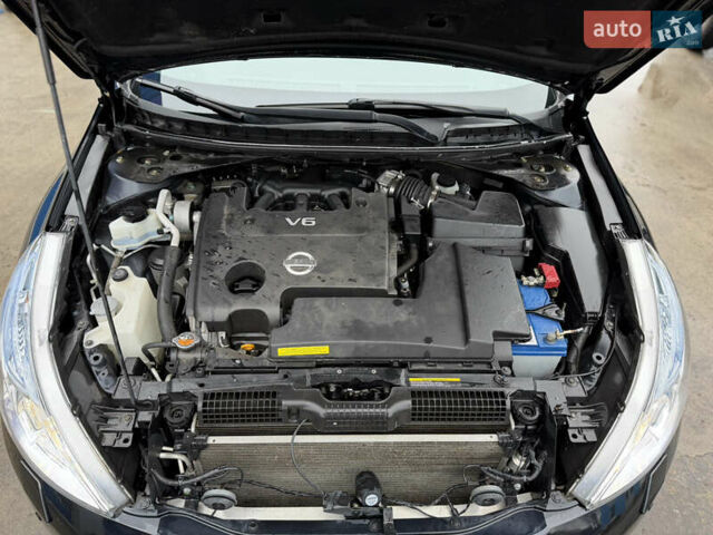 Черный Ниссан Теана, объемом двигателя 2.5 л и пробегом 99 тыс. км за 10700 $, фото 8 на Automoto.ua