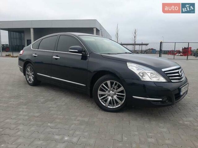 Черный Ниссан Теана, объемом двигателя 2.5 л и пробегом 205 тыс. км за 7950 $, фото 2 на Automoto.ua