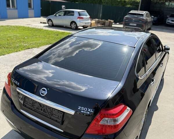 Черный Ниссан Теана, объемом двигателя 2.5 л и пробегом 100 тыс. км за 11700 $, фото 5 на Automoto.ua