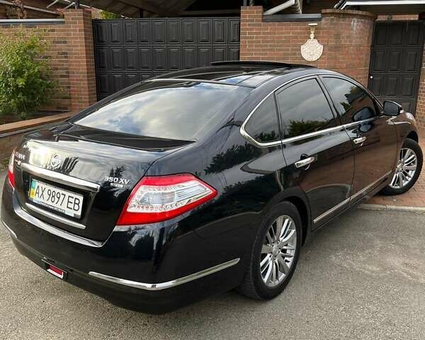 Чорний Ніссан Теана, об'ємом двигуна 3.5 л та пробігом 179 тис. км за 9999 $, фото 1 на Automoto.ua