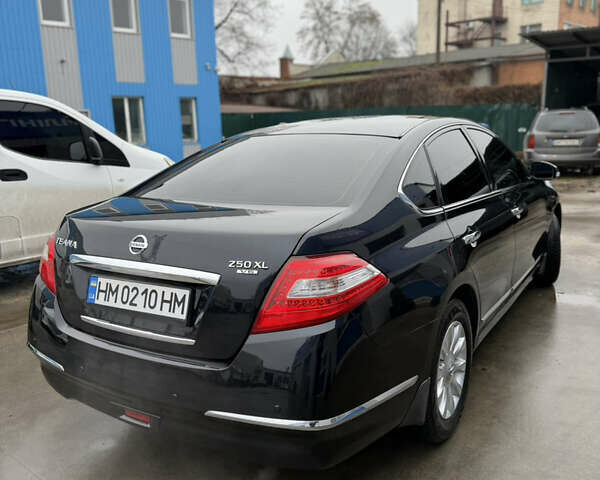 Черный Ниссан Теана, объемом двигателя 2.5 л и пробегом 99 тыс. км за 10700 $, фото 4 на Automoto.ua