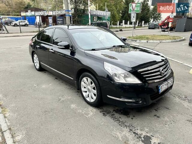 Черный Ниссан Теана, объемом двигателя 2.5 л и пробегом 176 тыс. км за 7500 $, фото 1 на Automoto.ua