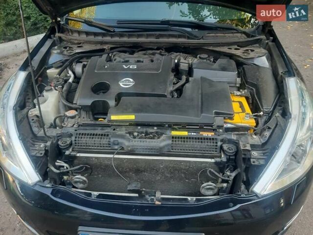 Ниссан Теана 2012 в Житомире на Automoto.ua Черный Ниссан Теана, объемом двигателя 2.5 л и пробегом 202 тыс. км за 7950 $, фото 15 на Automoto.ua