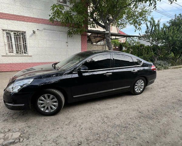 Черный Ниссан Теана, объемом двигателя 2.5 л и пробегом 132 тыс. км за 9900 $, фото 1 на Automoto.ua