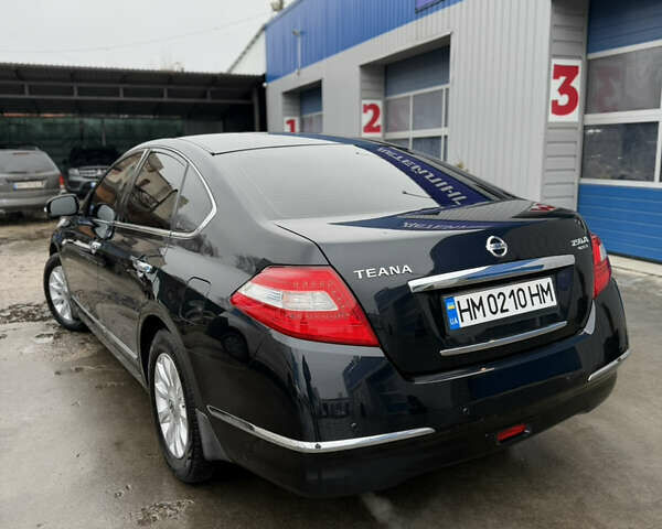 Черный Ниссан Теана, объемом двигателя 2.5 л и пробегом 99 тыс. км за 10700 $, фото 7 на Automoto.ua