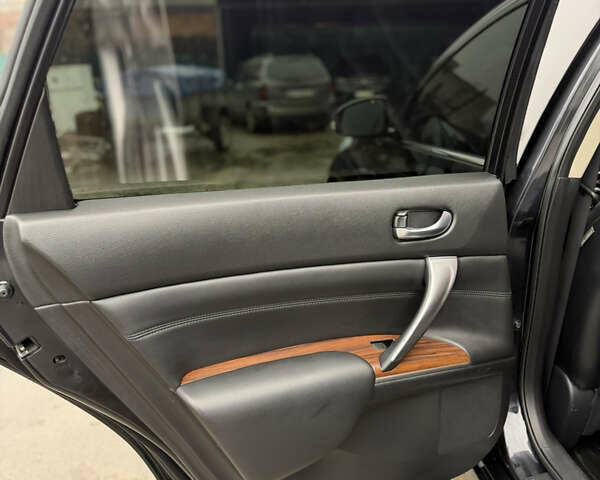 Черный Ниссан Теана, объемом двигателя 2.5 л и пробегом 99 тыс. км за 10700 $, фото 21 на Automoto.ua