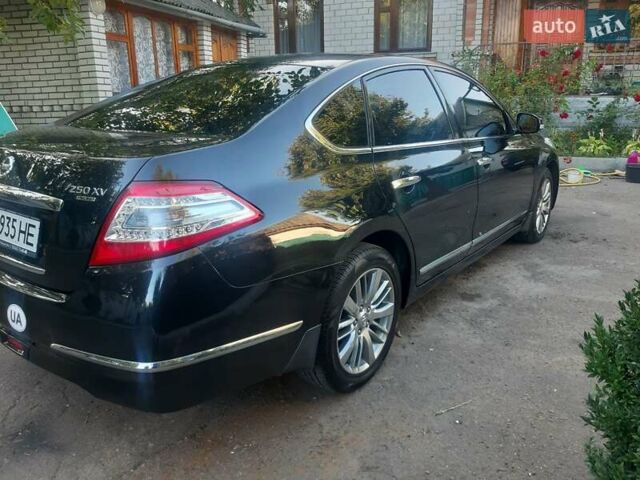 Ниссан Теана 2012 в Житомире на Automoto.ua Черный Ниссан Теана, объемом двигателя 2.5 л и пробегом 202 тыс. км за 7950 $, фото 5 на Automoto.ua