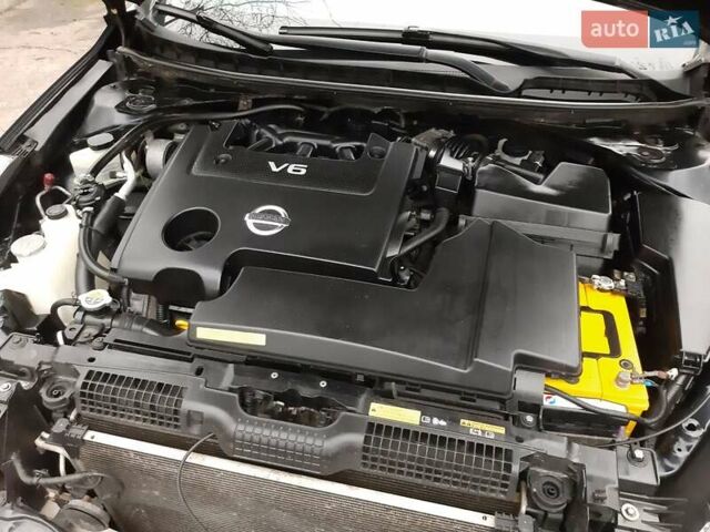 Черный Ниссан Теана, объемом двигателя 2.5 л и пробегом 205 тыс. км за 7950 $, фото 18 на Automoto.ua