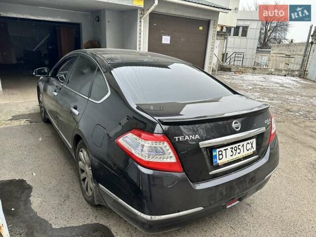 Черный Ниссан Теана, объемом двигателя 2.5 л и пробегом 176 тыс. км за 7500 $, фото 5 на Automoto.ua