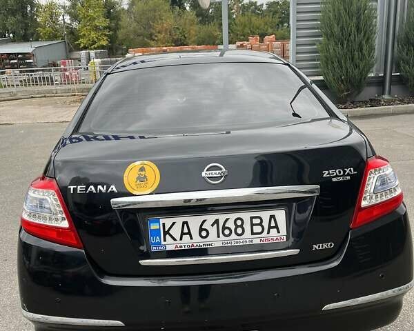 Чорний Ніссан Теана, об'ємом двигуна 2.5 л та пробігом 90 тис. км за 9000 $, фото 2 на Automoto.ua