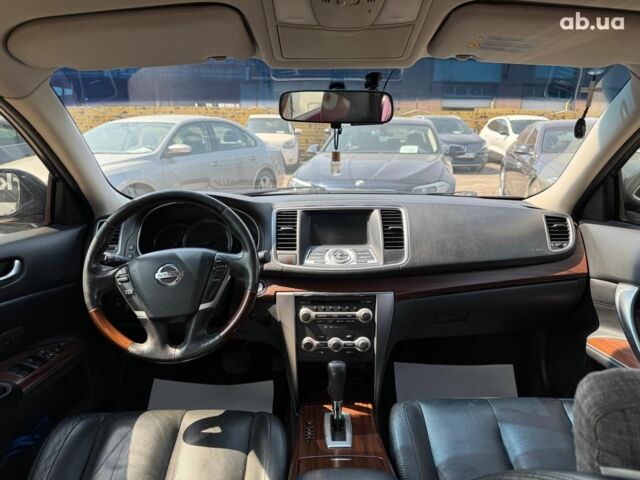Красный Ниссан Теана, объемом двигателя 3.5 л и пробегом 141 тыс. км за 10440 $, фото 11 на Automoto.ua