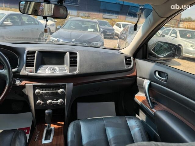 Красный Ниссан Теана, объемом двигателя 3.5 л и пробегом 141 тыс. км за 10440 $, фото 10 на Automoto.ua