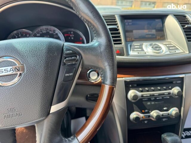 Красный Ниссан Теана, объемом двигателя 3.5 л и пробегом 141 тыс. км за 10440 $, фото 16 на Automoto.ua