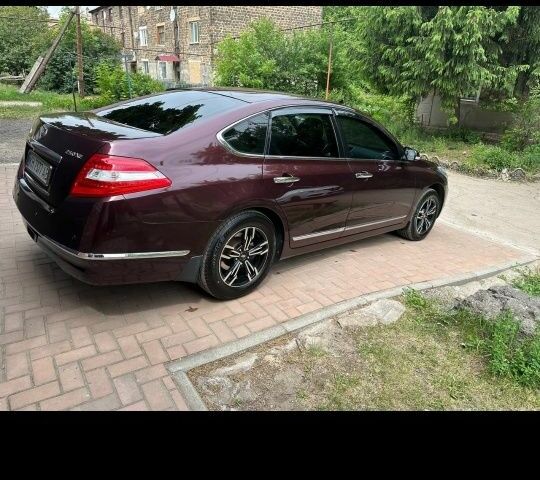 Червоний Ніссан Теана, об'ємом двигуна 2.5 л та пробігом 223 тис. км за 8700 $, фото 7 на Automoto.ua