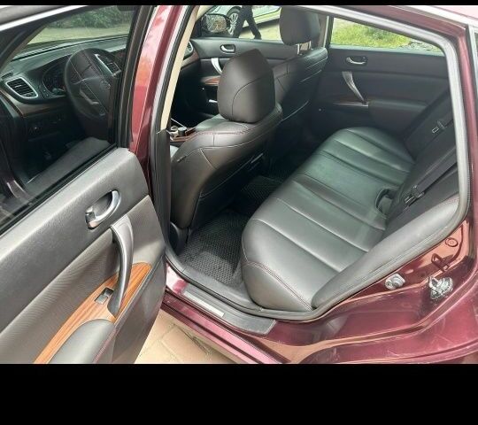 Червоний Ніссан Теана, об'ємом двигуна 2.5 л та пробігом 223 тис. км за 8700 $, фото 4 на Automoto.ua