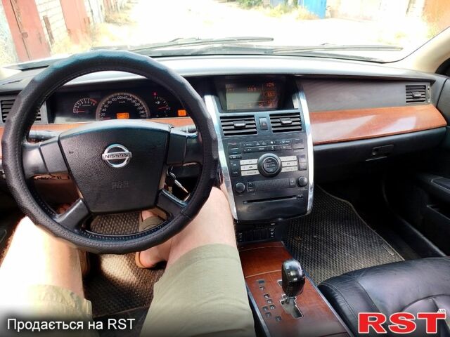 Серый Ниссан Теана, объемом двигателя 2.3 л и пробегом 280 тыс. км за 5000 $, фото 1 на Automoto.ua