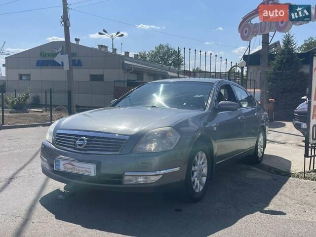 Серый Ниссан Теана, объемом двигателя 2.3 л и пробегом 239 тыс. км за 6199 $, фото 2 на Automoto.ua