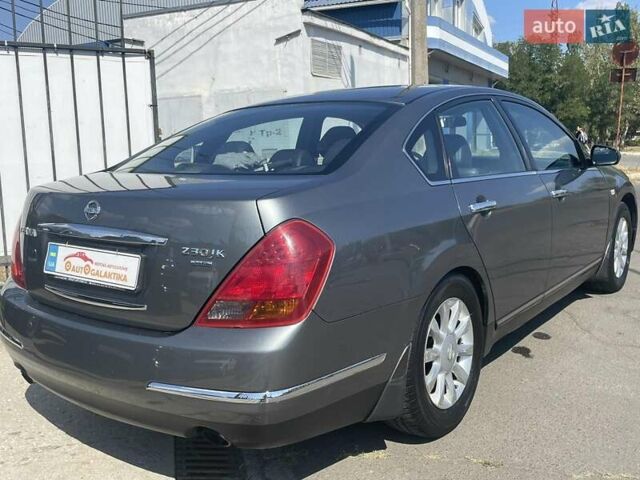 Серый Ниссан Теана, объемом двигателя 2.3 л и пробегом 239 тыс. км за 6199 $, фото 3 на Automoto.ua