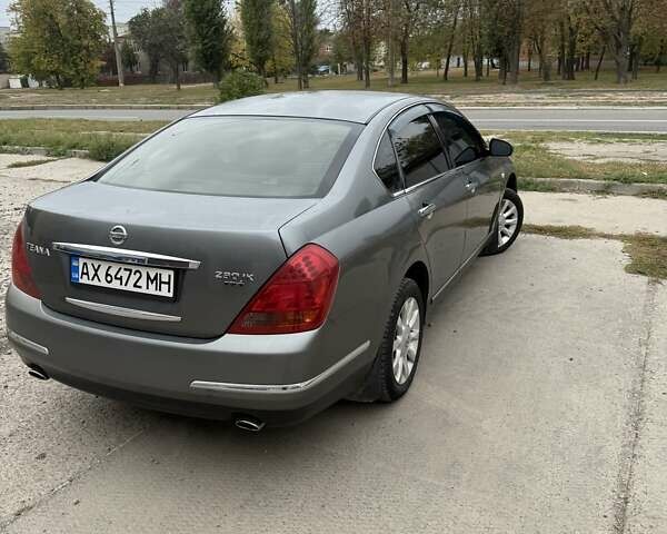 Серый Ниссан Теана, объемом двигателя 2.35 л и пробегом 214 тыс. км за 5300 $, фото 3 на Automoto.ua