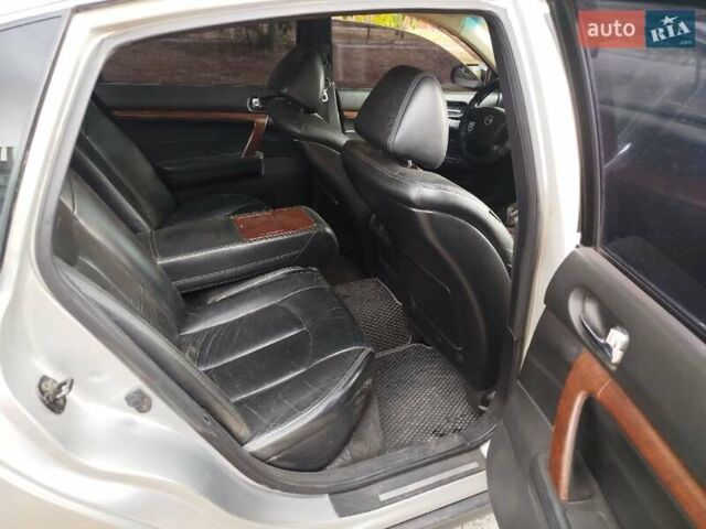 Серый Ниссан Теана, объемом двигателя 2.3 л и пробегом 288 тыс. км за 4100 $, фото 5 на Automoto.ua